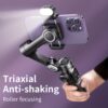 The AOCHUAN Smart XE Is a Compact And Foldable Gimbal Stabilizer Featuring Three-Axis Stabilization And Anti-Shake Technology. It Includes a Built-In RGB Seven-Color Magnetic Fill Light And Offers 360-Degree Rotation with AI Automatic Face Tracking
